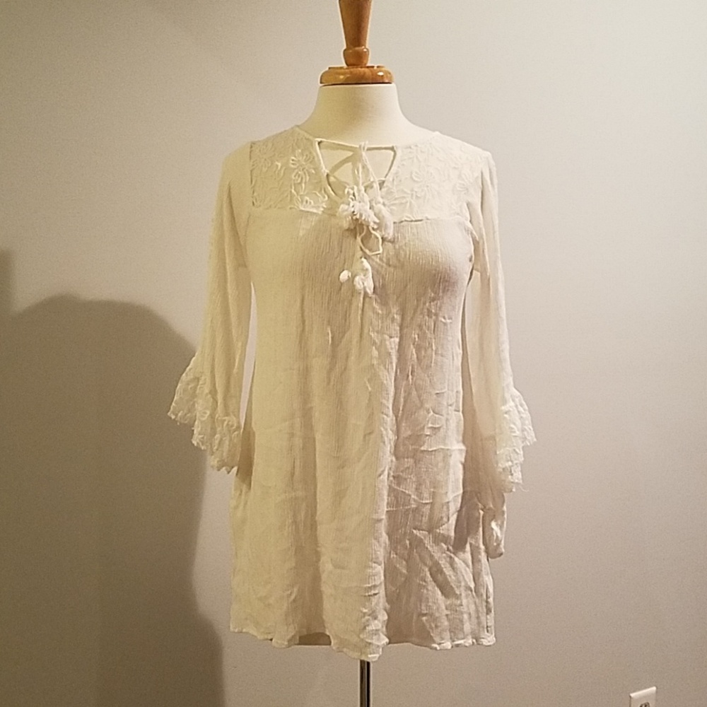 Umgee white top in a size S